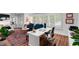Comfortable home office featuring a desk, seating area, and natural light at 500 Tallahassee Ne Dr, St Petersburg, FL 33702