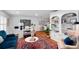 Inviting home office with a large desk, comfy seating, and built-in bookshelves, perfect for productivity and relaxation at 500 Tallahassee Ne Dr, St Petersburg, FL 33702