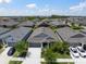Beautiful single Gathering home with a well manicured lawn in an attractive neighborhood with a blue sky at 5609 Silver Sun Dr, Apollo Beach, FL 33572