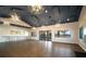 Open event space with elegant lighting fixtures, bar seating and scenic views, perfect for celebrations at 5609 Silver Sun Dr, Apollo Beach, FL 33572