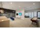 Well-lit game room featuring a chalkboard wall, seating, and a shuffleboard table, perfect for socializing at 5609 Silver Sun Dr, Apollo Beach, FL 33572