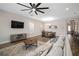 Inviting living room and dining area with hardwood floors and neutral decor at 5609 Silver Sun Dr, Apollo Beach, FL 33572