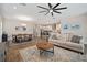 Spacious living room connecting to the kitchen and dining area at 5609 Silver Sun Dr, Apollo Beach, FL 33572
