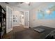 Office space with a large desk and a view into the hallway at 5609 Silver Sun Dr, Apollo Beach, FL 33572