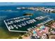 Aerial view of a marina with many boats, swimming pool, and waterfront property at 5823 Bowen Daniel Dr # 606, Tampa, FL 33616