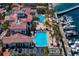 Community featuring dual pools, convenient parking, lush landscaping, and marina access at 5823 Bowen Daniel Dr # 606, Tampa, FL 33616