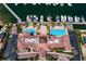 Aerial view of the property, including pools, marina, and lush landscaping at 5823 Bowen Daniel Dr # 606, Tampa, FL 33616