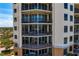 Condo balcony features ample space for seating and views of the community at 5823 Bowen Daniel Dr # 606, Tampa, FL 33616