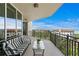 Enjoy this expansive balcony with comfortable seating and stunning views at 5823 Bowen Daniel Dr # 606, Tampa, FL 33616