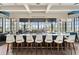 Upscale bar area with marble counter, stylish seating, pendant lighting, and well-stocked shelves at 5823 Bowen Daniel Dr # 606, Tampa, FL 33616