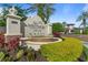 Westshore Yacht Club entrance featuring a beautiful fountain and manicured landscaping at 5823 Bowen Daniel Dr # 606, Tampa, FL 33616