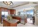 Modern kitchen featuring stainless steel appliances, granite counters and scenic views at 5823 Bowen Daniel Dr # 606, Tampa, FL 33616