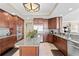 Gourmet kitchen with stainless steel appliances and ample counter space at 5823 Bowen Daniel Dr # 606, Tampa, FL 33616