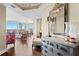 Bright and open living room with hardwood floors and access to a balcony overlooking the water at 5823 Bowen Daniel Dr # 606, Tampa, FL 33616