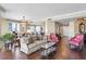 Open-concept living room with hardwood floors and stylish furnishings at 5823 Bowen Daniel Dr # 606, Tampa, FL 33616
