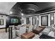 Entertainment theater featuring comfortable seating, a large screen, and stylish interior design elements at 5823 Bowen Daniel Dr # 606, Tampa, FL 33616