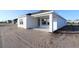 Contemporary home with a covered patio, perfect for outdoor entertaining and relaxation at 6270 Broad Field Ave, Apollo Beach, FL 33572
