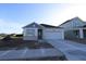 Charming single-story home featuring stone accents, a two-car garage, and a well-manicured lawn at 6270 Broad Field Ave, Apollo Beach, FL 33572