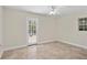 Bright, airy bedroom with backyard access through French doors at 628 Bosphorous Ave, Tampa, FL 33606