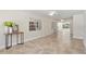 Spacious living room with neutral tones, tile floors, and ample natural light at 628 Bosphorous Ave, Tampa, FL 33606