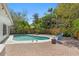 A backyard pool, patio and tropical landscaping at 628 Bosphorous Ave, Tampa, FL 33606