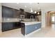Modern kitchen with stainless steel appliances, granite countertops, and stylish cabinetry at 6524 Park Strand Dr, Apollo Beach, FL 33572