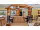 Spacious eat-in kitchen with granite countertops and wooden cabinetry at 6821 Date Palm S Ave, St Petersburg, FL 33707