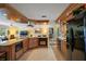 Beautiful open kitchen with ample counter space, modern appliances, and a seamless flow into the living area at 6821 Date Palm S Ave, St Petersburg, FL 33707