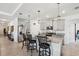 Contemporary kitchen featuring stainless steel appliances, granite counters, and pendant lighting at 7323 Steer Blade Dr, Zephyrhills, FL 33541