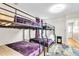 The bedroom offers two sets of bunkbeds with a clean, modern design at 7530 85Th Ln, Seminole, FL 33777