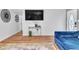 Bright living room with hardwood floors and a modern sofa at 7530 85Th Ln, Seminole, FL 33777