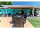 Outdoor patio with wicker furniture and dining area, perfect for entertaining guests at 7530 85Th Ln, Seminole, FL 33777