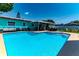 Backyard pool with adjacent seating areas for relaxing and socializing in the sun at 7530 85Th Ln, Seminole, FL 33777