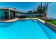 Spacious backyard with inviting pool, patio area, and outdoor seating for relaxation and entertaining at 7530 85Th Ln, Seminole, FL 33777
