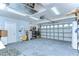 Spacious two-car garage providing ample room for storage and parking at 7824 Primula Ln, New Port Richey, FL 34654