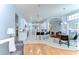Spacious layout connecting a stylish living area with a well-equipped kitchen and breakfast bar at 7824 Primula Ln, New Port Richey, FL 34654