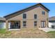 Exterior of home featuring patio, sliding glass door and french doors at 8103 Tar Hollow Dr, Gibsonton, FL 33534