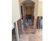 The hallway showcases exposed wall framing and tiled flooring, undergoing renovations at 833 Lantana Ave, Clearwater Beach, FL 33767