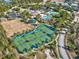 Aerial view of the community tennis courts and other neighborhood amenities at 8463 Dunham Station Dr, Tampa, FL 33647