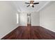 Bright, spacious bedroom with hardwood floors and neutral wall colors at 8463 Dunham Station Dr, Tampa, FL 33647