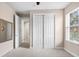 A bedroom featuring closet and neutral carpet at 8463 Dunham Station Dr, Tampa, FL 33647