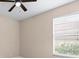 Bedroom featuring neutral walls, ceiling fan and carpet at 8463 Dunham Station Dr, Tampa, FL 33647