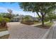 Charming home showcasing an inviting driveway and well-manicured landscaping at 8463 Dunham Station Dr, Tampa, FL 33647