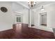 Bright open living room with hardwood floors and neutral wall colors at 8463 Dunham Station Dr, Tampa, FL 33647