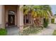 Welcoming front entrance with decorative door, well-maintained landscaping, and a paved walkway at 9327 Pontiac Dr, Tampa, FL 33626