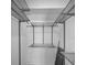 Walk-in closet featuring adjustable metal shelving and rods, maximizing storage space at 962 Marco Ne Dr, St Petersburg, FL 33702