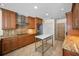 Updated kitchen with stainless steel appliances, granite countertops and island at 962 Marco Ne Dr, St Petersburg, FL 33702