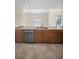 Kitchen featuring granite countertops, stainless steel appliances, and tile floors at 962 Marco Ne Dr, St Petersburg, FL 33702