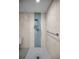 Updated shower with modern fixtures and blue tile accent at 962 Marco Ne Dr, St Petersburg, FL 33702