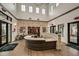 Inviting lobby area with a stone reception desk and modern decor at 10870 Rustic Eve Ct, Land O Lakes, FL 34638